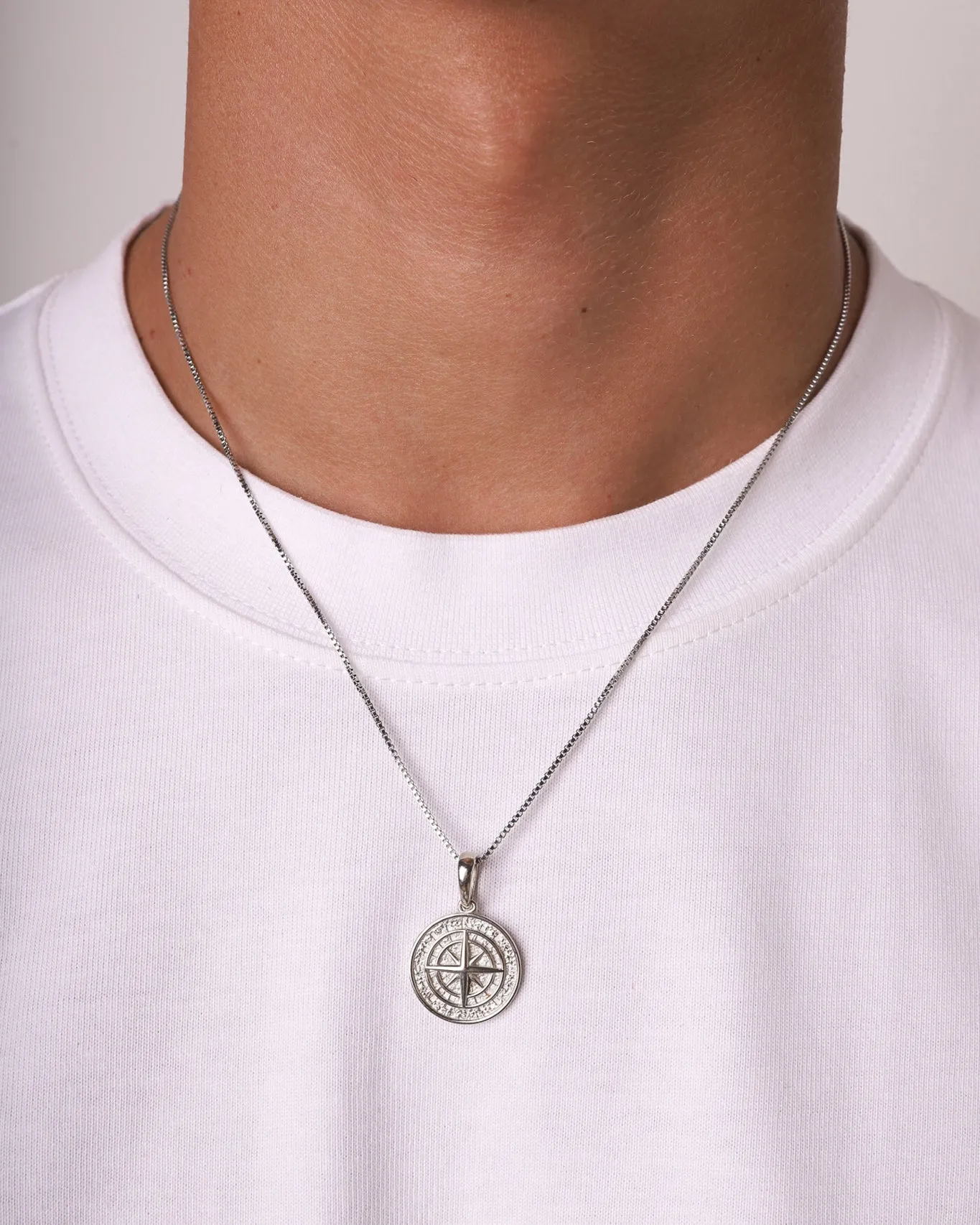 CLEAN COMPASS PENDANT.