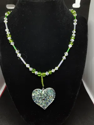 N#104 Period Crystals (Aug. Birthstones), Clear Crystals, Silver and Glitter in a Heart?